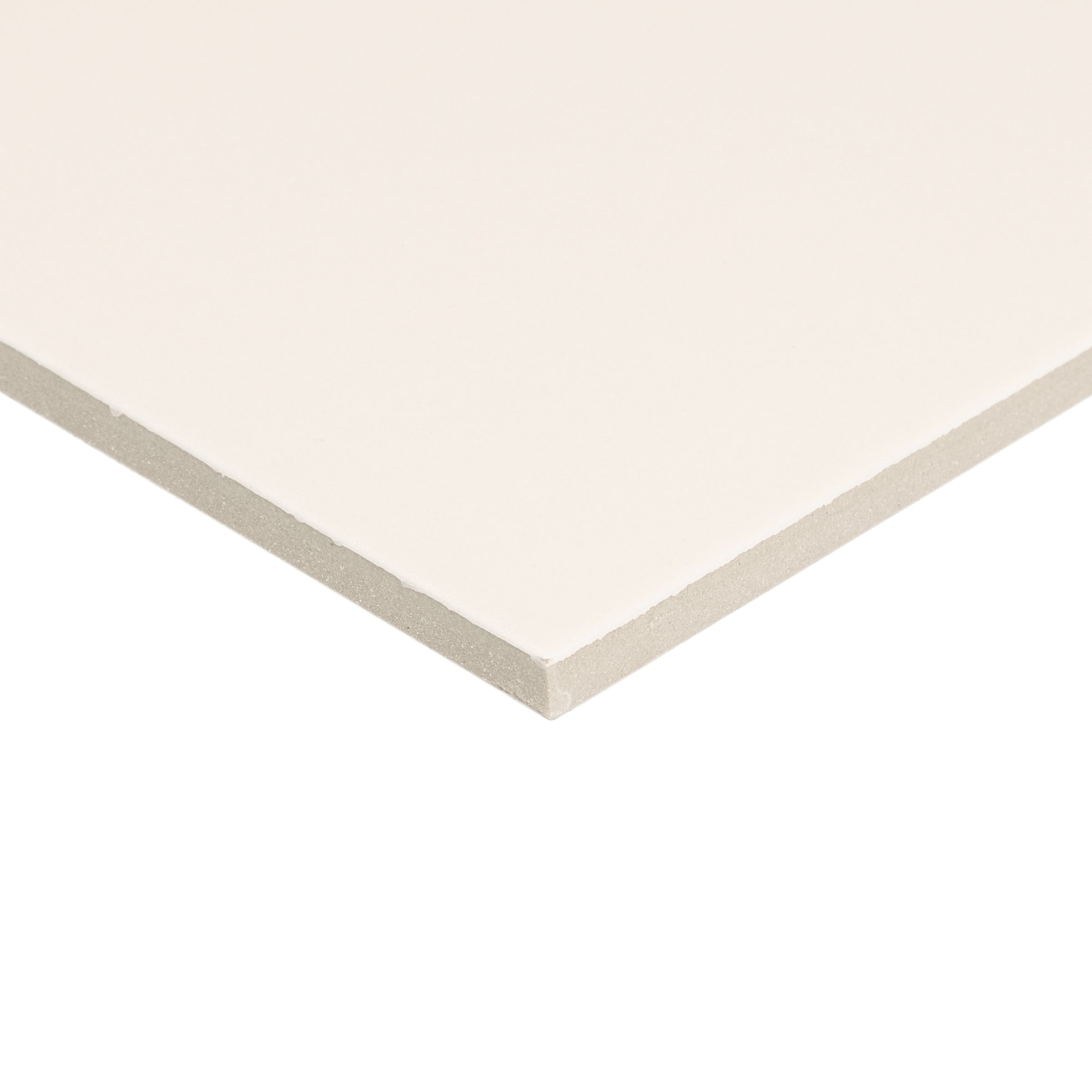 Close-up of a pale sand-colored porcelain tile with a smooth matte finish and sharp clean edges on a white background