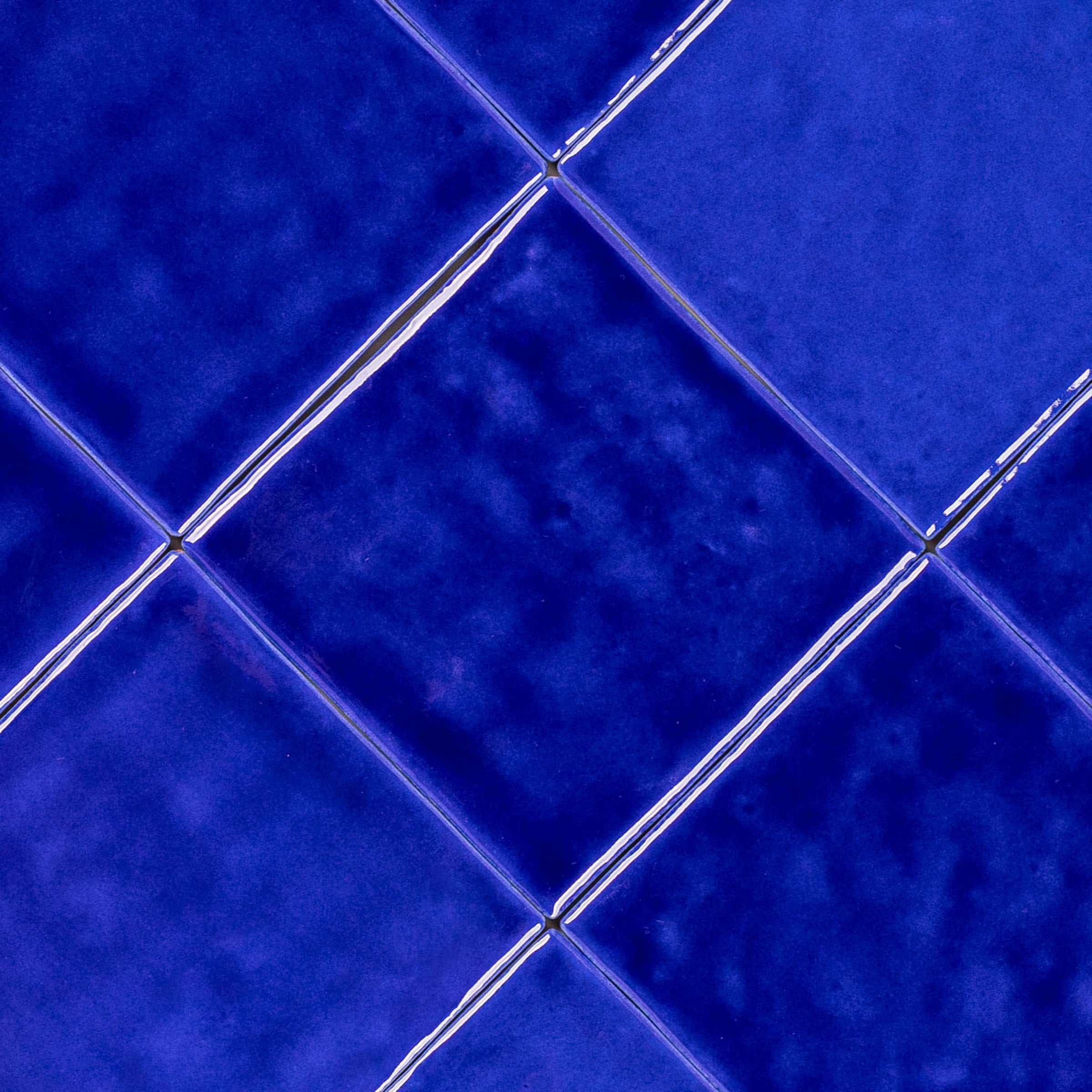 Sapphire Glossy Ceramic Tile in rich blue with handcrafted Moroccan zellige style from Small Format Tiles and Zel Glazed Ceramic Tiles collections