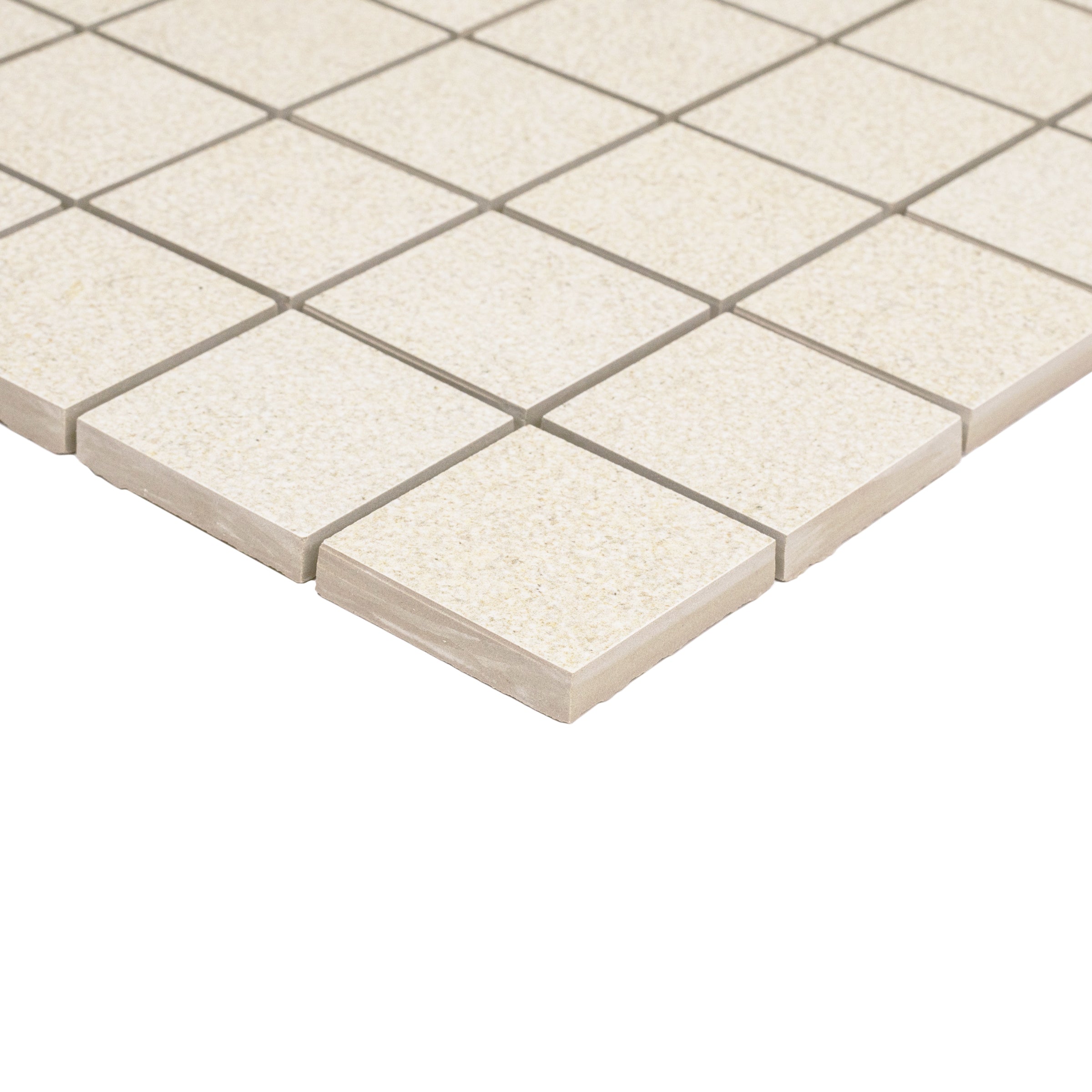 Almond Hammered Limestone Look Porcelain Mosaic in beige porcelain tiles from Stone Editions at Reno Source, globally sourced