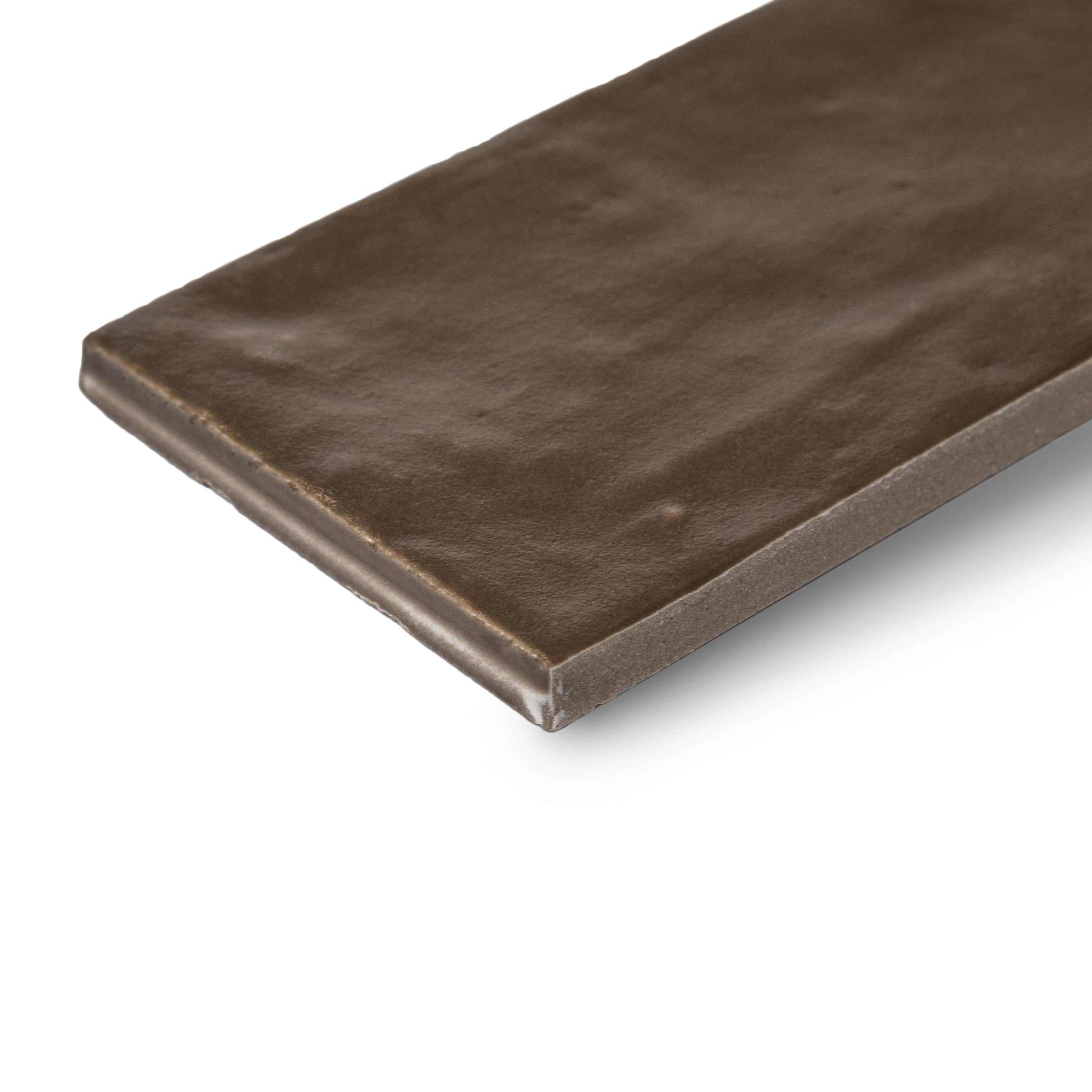 Rectangular porcelain tile in deep sienna with a subtle textured surface and natural matte finish