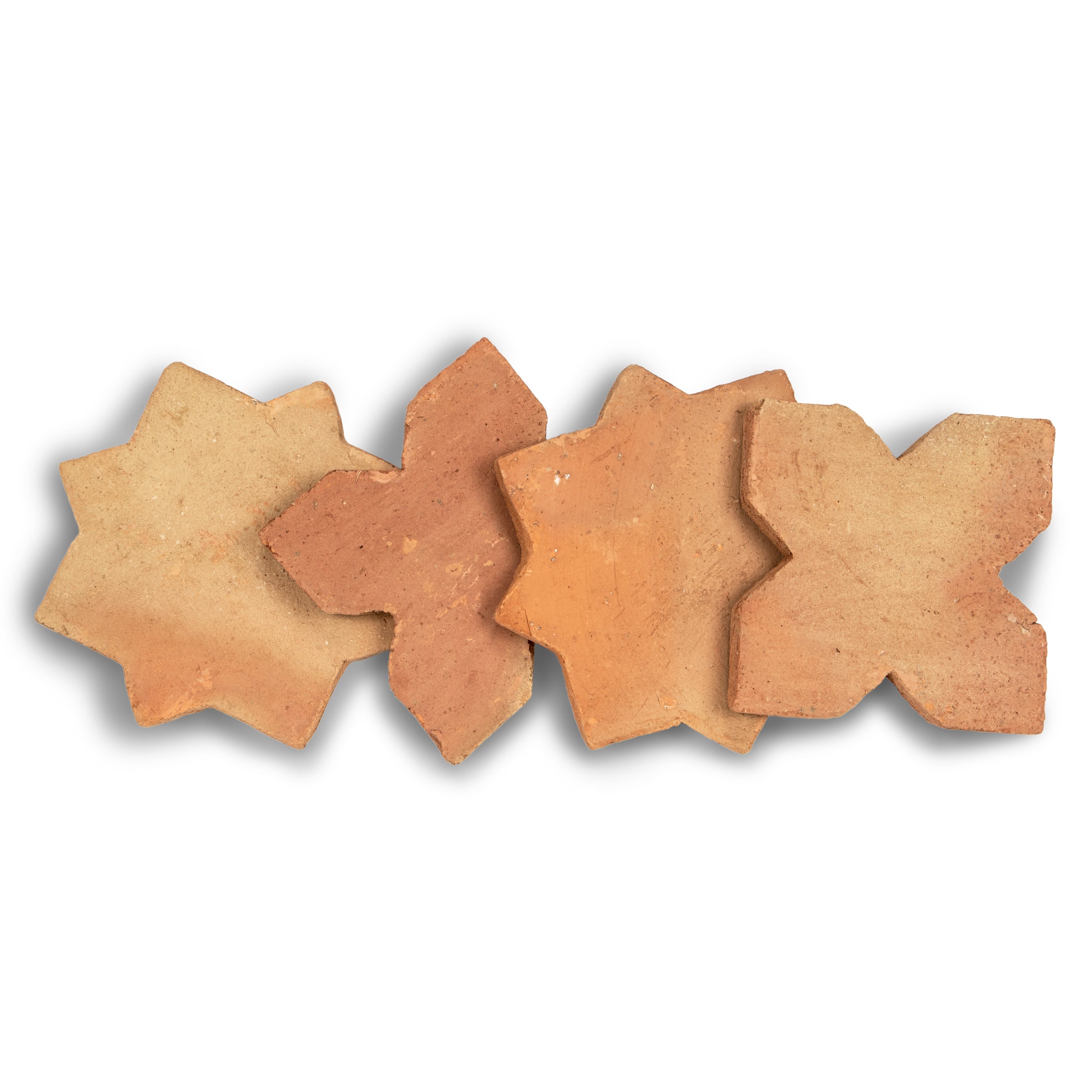 Star & Cross Classic Terracotta Tile Sample showcasing four terracotta tiles in varied warm shades from the Terracotta collection
