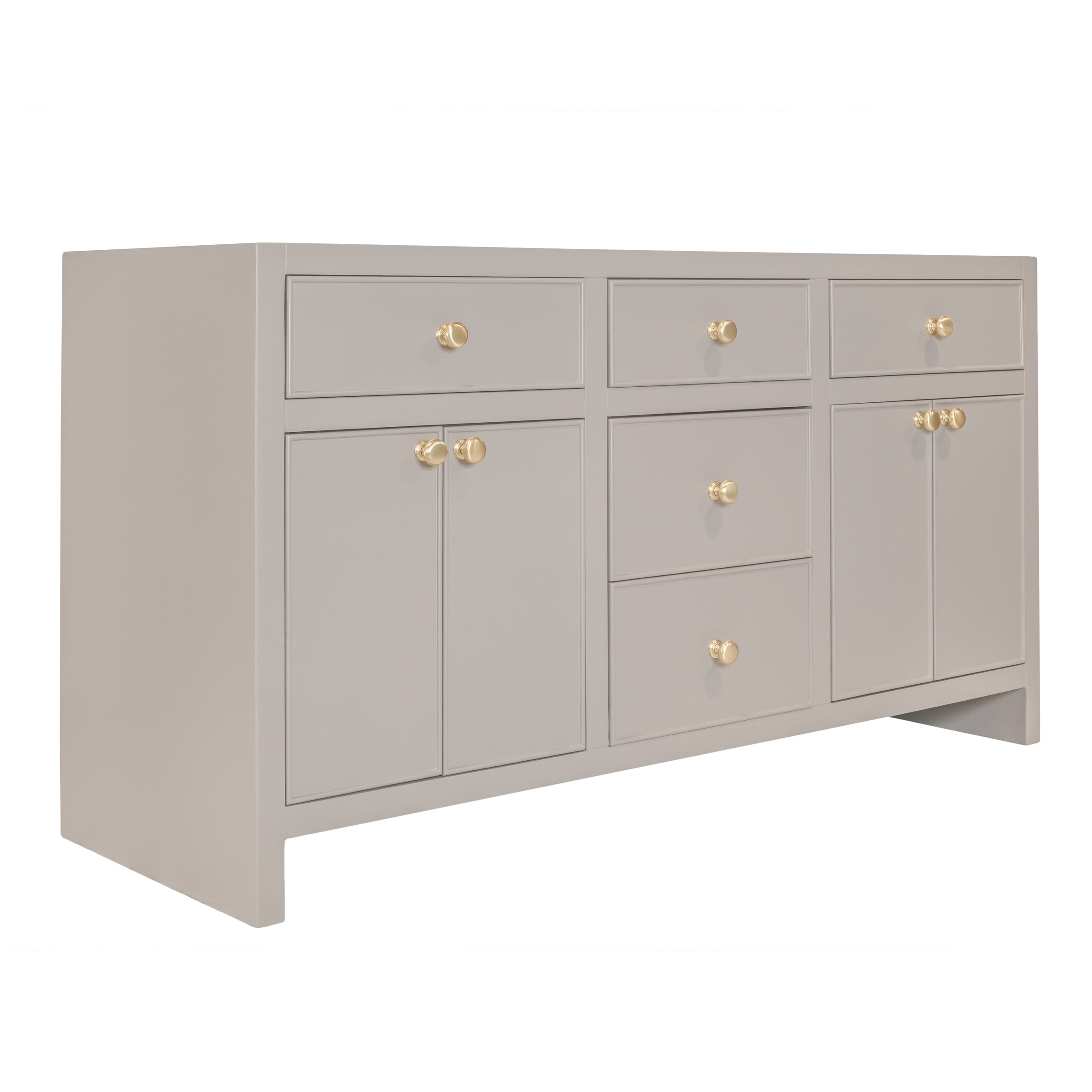 Light taupe wooden cabinet featuring brass knobs with a combination of drawers and double-door compartments in a modern design