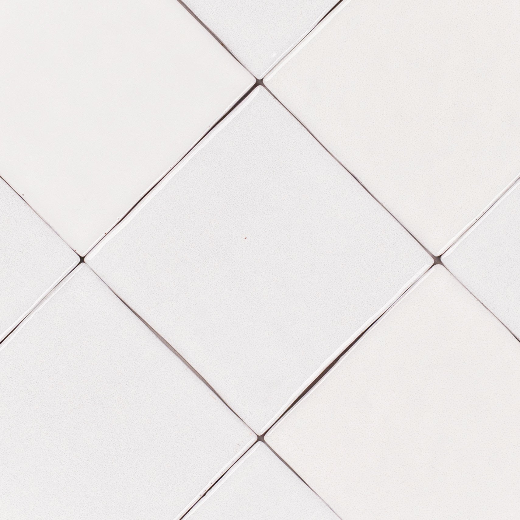 White Glossy Ceramic Tile with subtle handcrafted texture in white from Small Format Tiles, Zel Glazed Ceramic Tiles collections