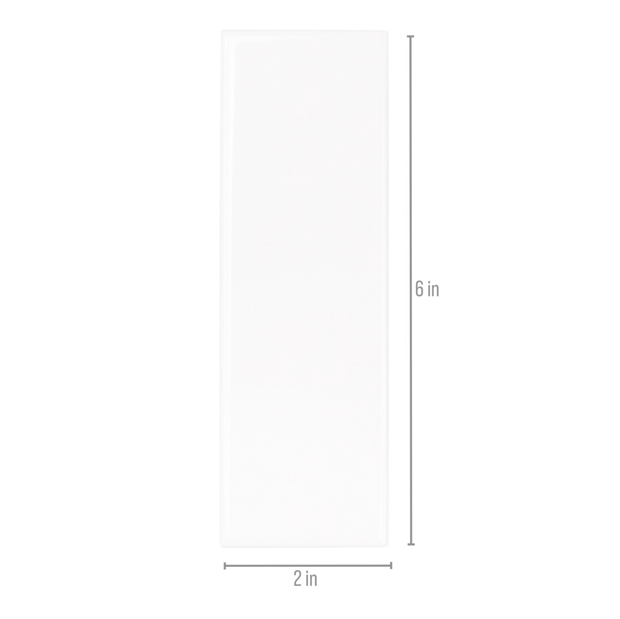Glossy white porcelain tile with smooth finish and clean edges displayed with 2 by 6 inch size guide