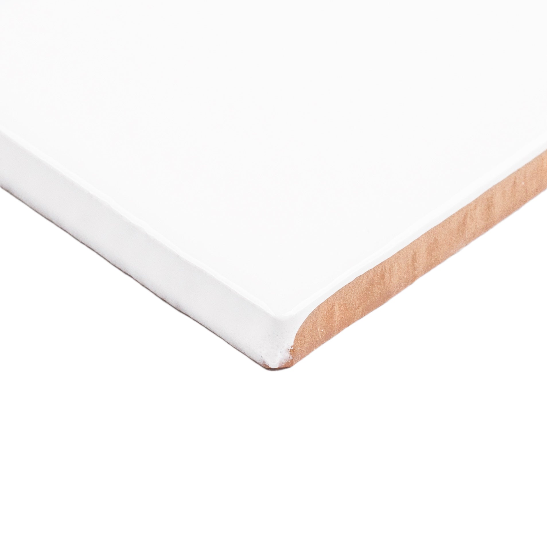 White 3x6 Glossy Ceramic Tile with bright white gloss and subtle undulating edges from Seville Glossy Ceramic Tiles collection