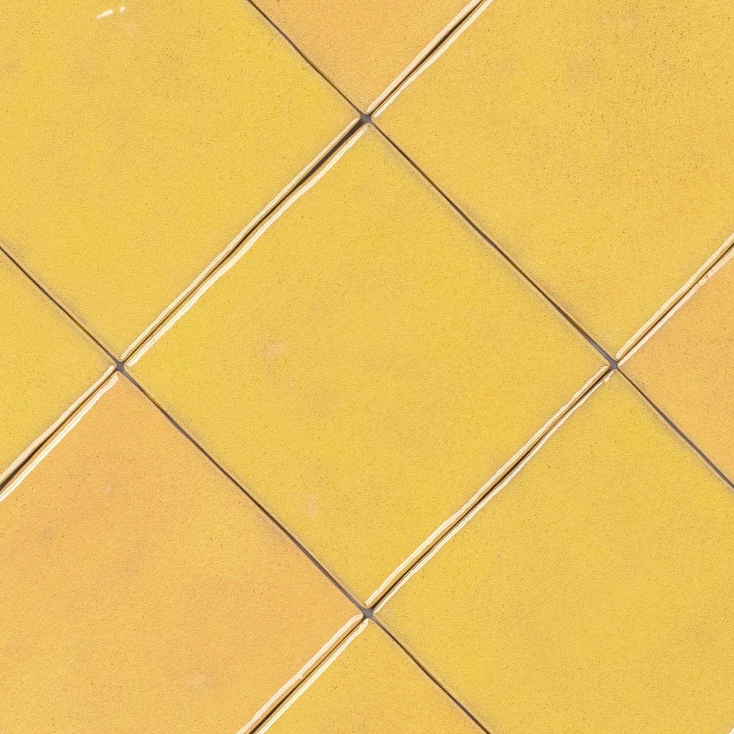 Lemon Glossy Ceramic Tile in yellow ceramic with glossy finish from Small Format Tiles and Zel Glazed Ceramic collections