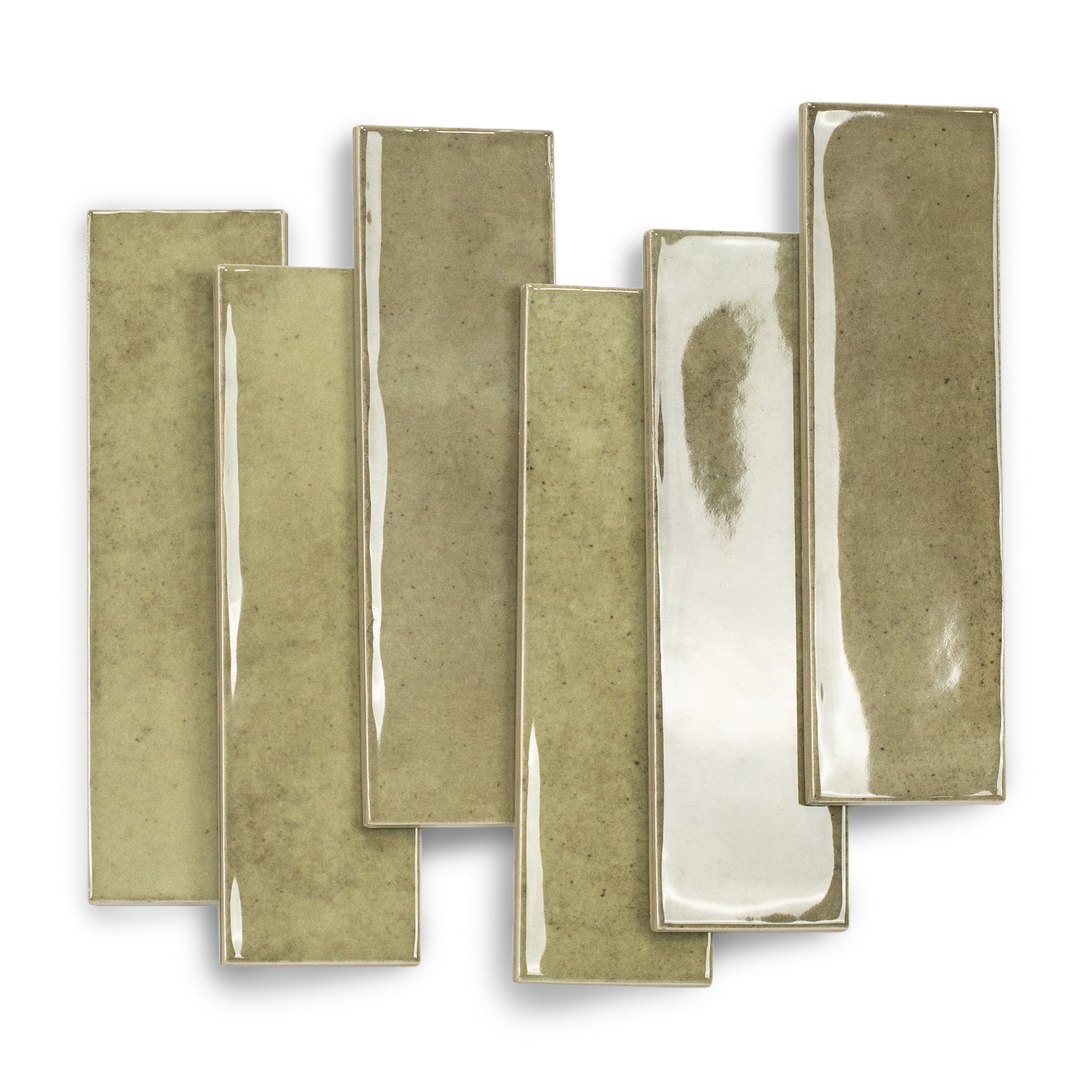 Glossy ceramic tiles in varied earthy green shades arranged side by side on a white background