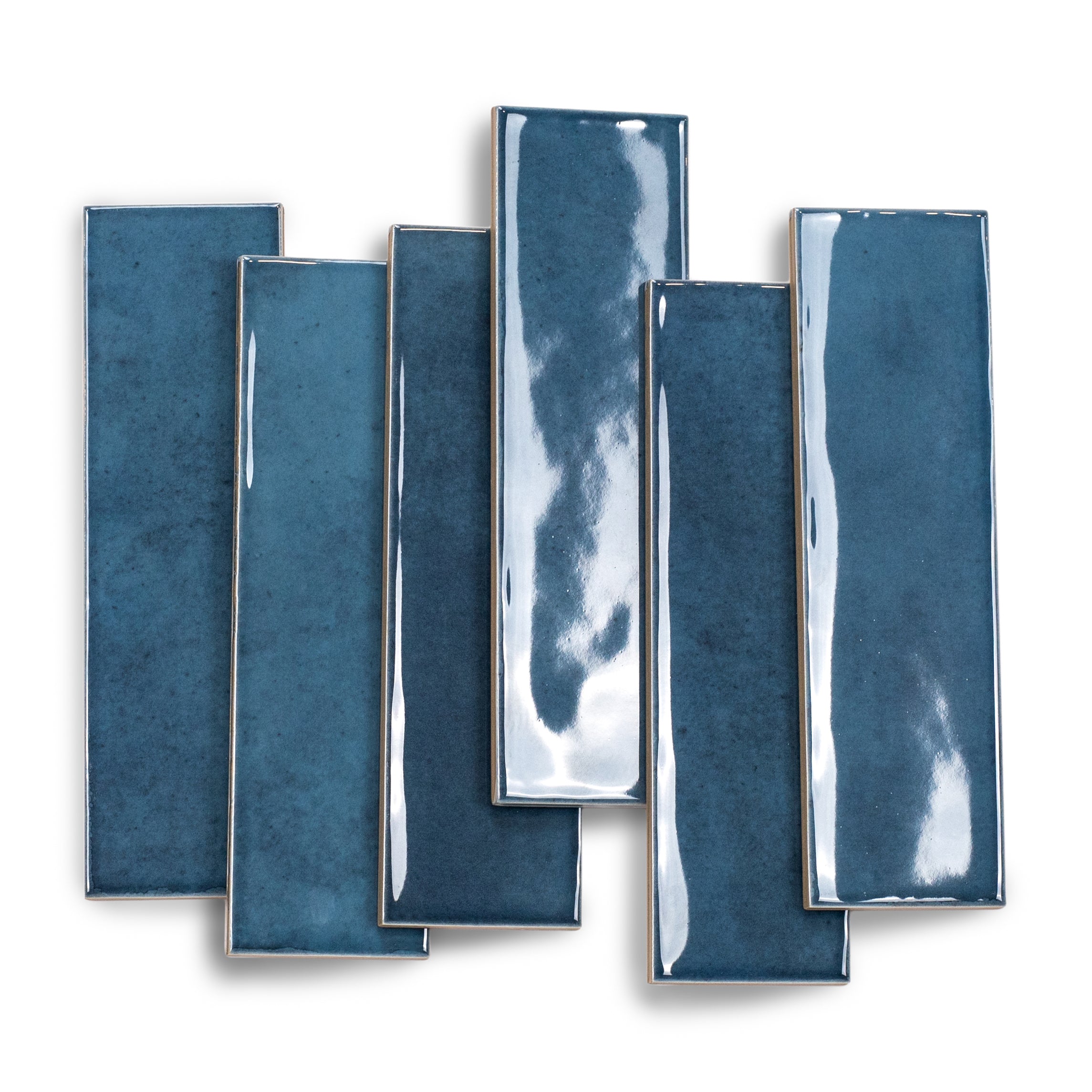 Glossy blue ceramic tiles with slight texture arranged vertically on a white background for design inspiration