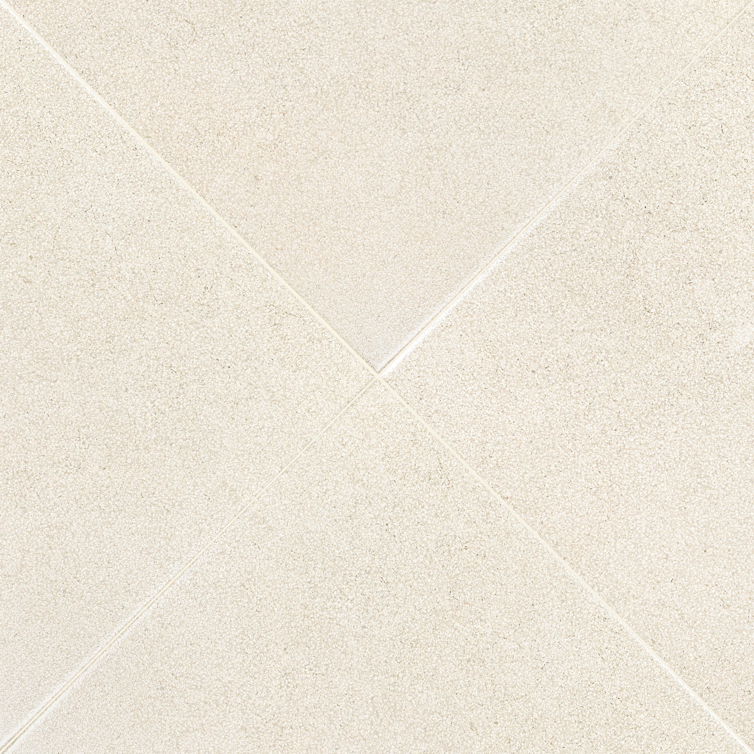 Almond Hammered Limestone Look Matte Porcelain Tile in beige porcelain from Stone Editions at Reno Source large format tiles collection
