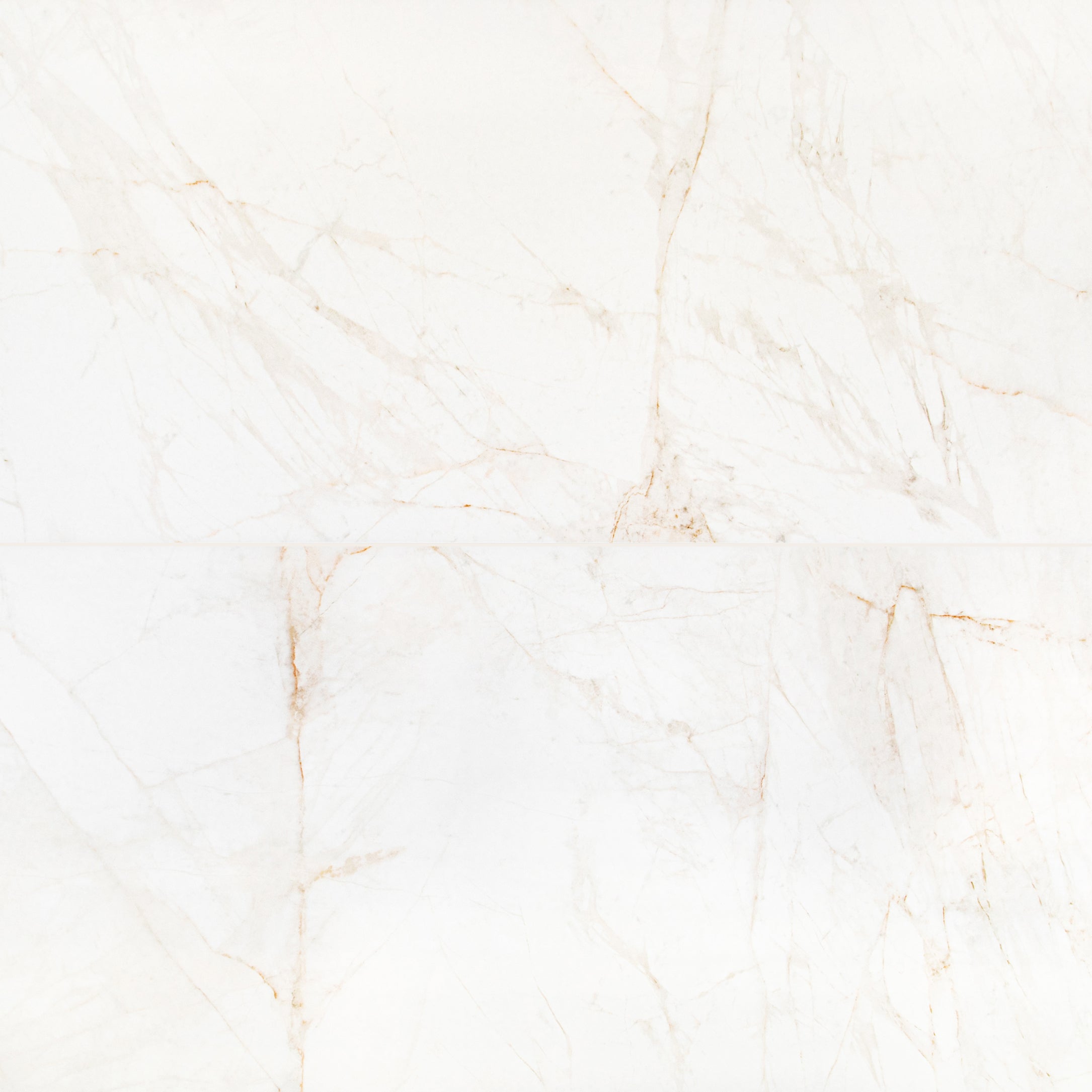 Spider Gold Matte Marble Look Porcelain Tile with delicate gold and beige veining on white in Large Format Tiles at Reno Source