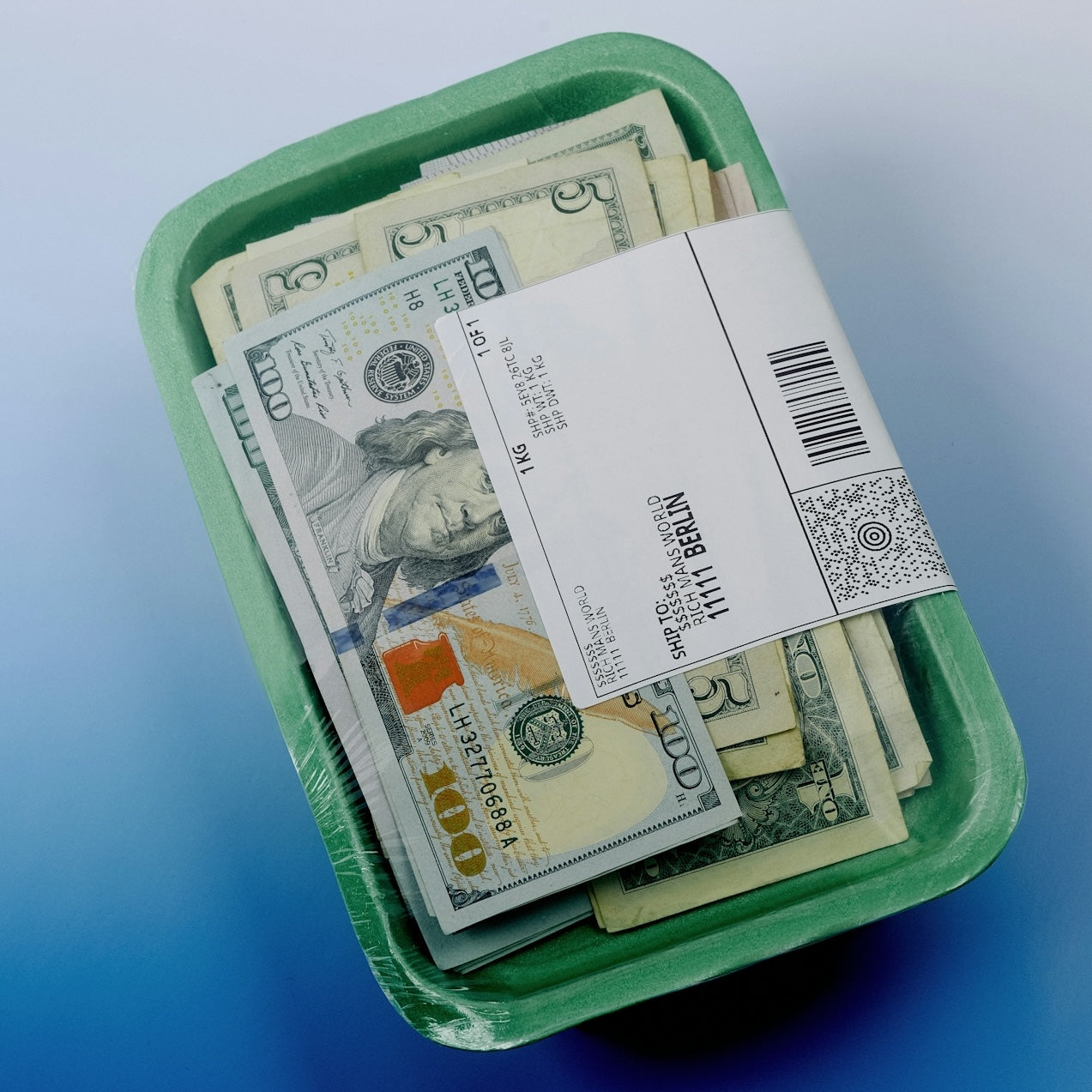 Stack of US dollar bills wrapped in plastic and sealed with a shipping label on a green tray against gradient background